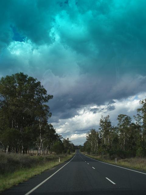typical australian rural road, a long highway through the bush