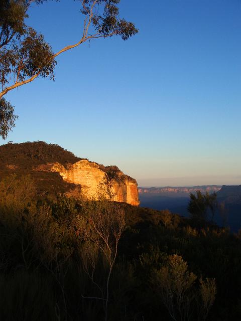 sandstone cliffs near katoomba, lit by late evening sunlight