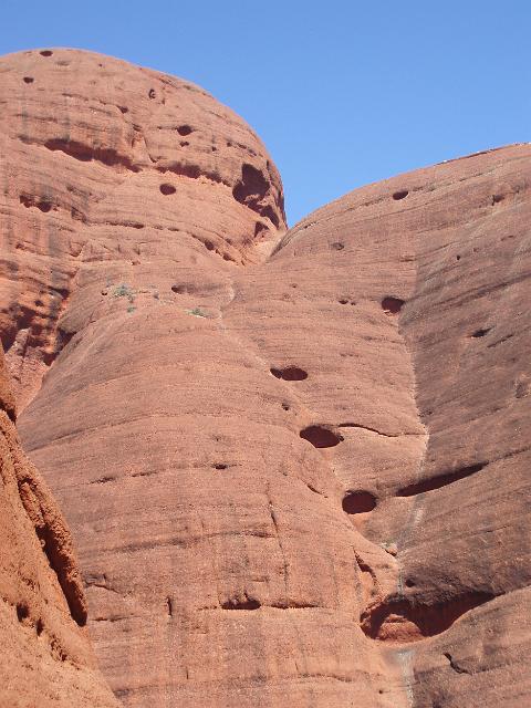 impressive eroded red sandstone cliffs of kata tjutas valley of the winds