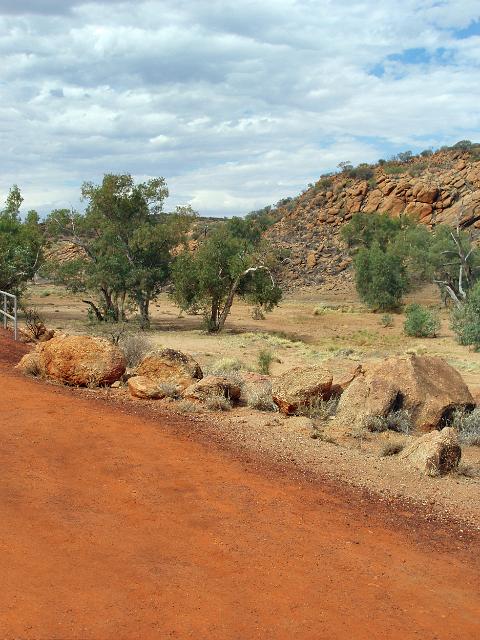 a dirt track rich in red iron colour