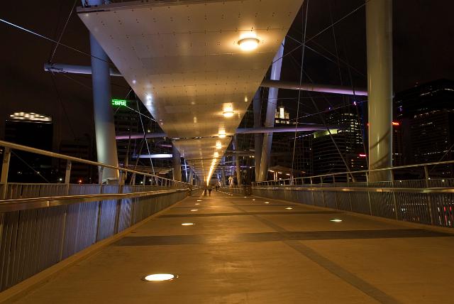 Kulripa Bridge, Brisbane, Australia is a pedestrian and cycle bridge over the Brisbane River originally called Tank Street Brige, view illuminated at night