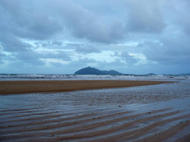 dunk island viewed from the mainland at mission beach on a stormy day