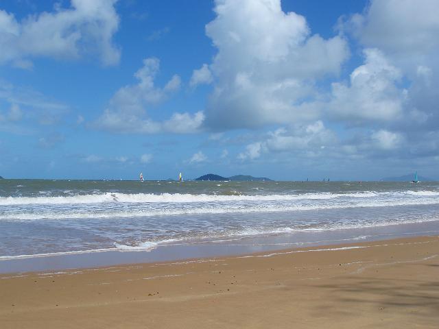 several small sailing dinghys off the shore at mission beach, north queensland