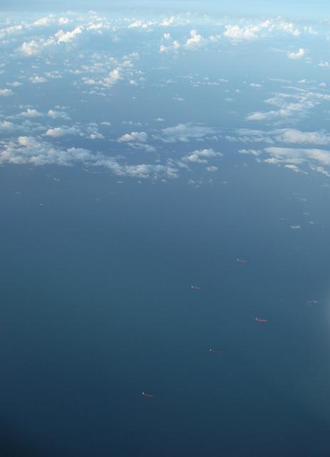 a background image, lines of bulk carrier ships off the queensland coast, gladstone