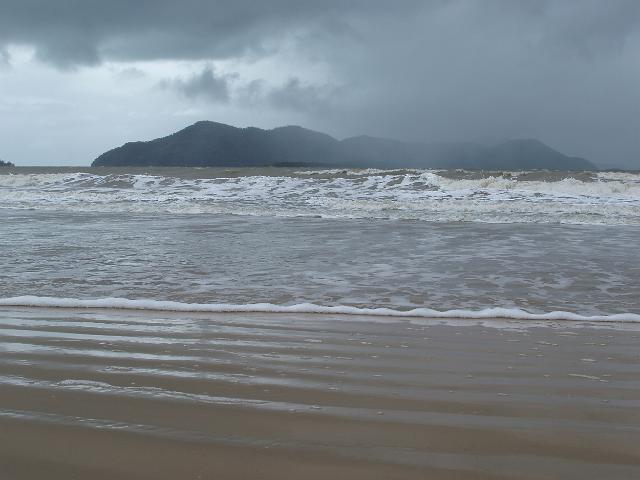 dunk island viewed from south mission beach on a stormy day