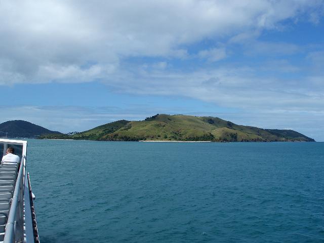 a view of dent island from a passing ferry, whitsundays, queensland
