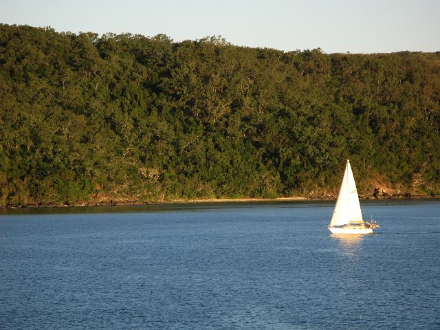 leisurely cruising through the whitsunday islands on a sailing yacht