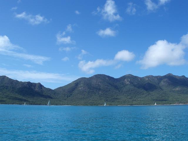 yachts sailing along the coast of gloucester island, queensland, australia