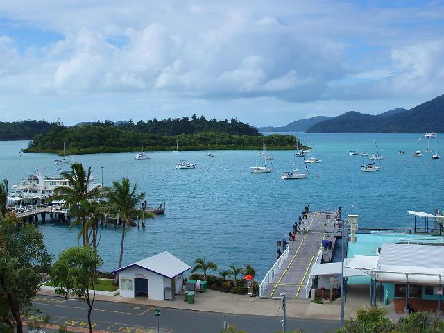 moored yachts on the quayside at shute harbour, queensland