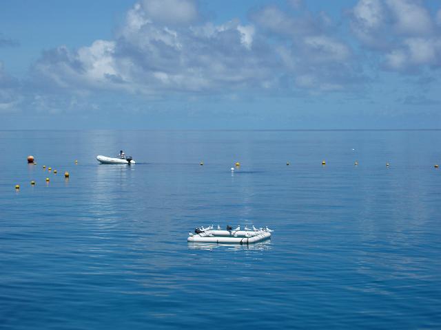 a calm day on the water at knuckle reef pontoon, great barrier reef, queensland