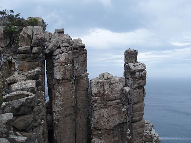 spectacular rocks formations with sheer vertical drops are a feature of the cliffs around cape pillar