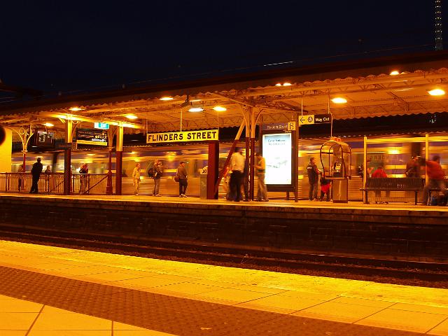 night time view of flinders street station platforms