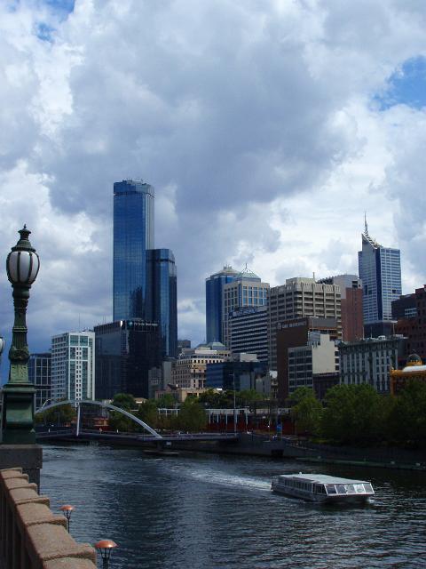 a view across the yarra river towards the rialto towers, melbourne CBD