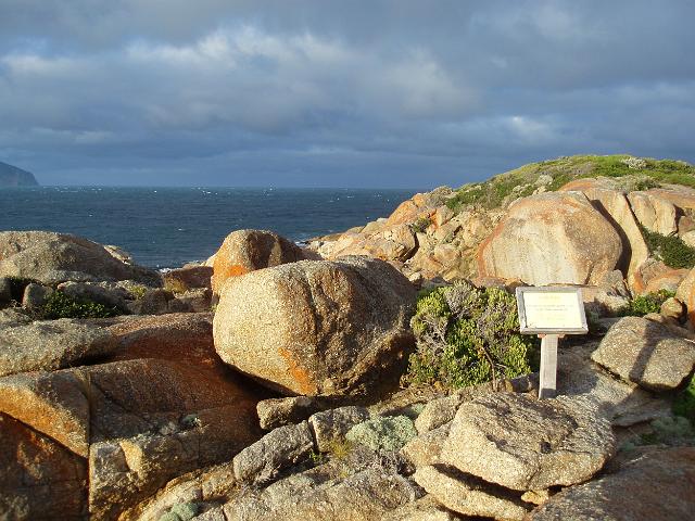 a small sign at south point marking australias most southerly point