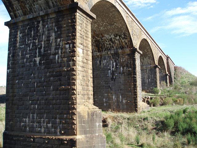 low angle view of a stone arch railway viaduct