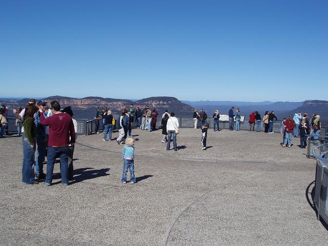 tourists enjoying the view from echo point, katoomba, blue mountains