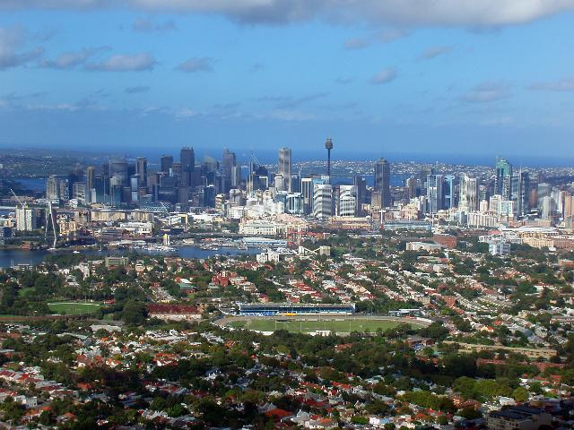 an aerial view of central sydney including the office buildings of the CBD and the suburbs of Ultimo and Glebe in the foreground