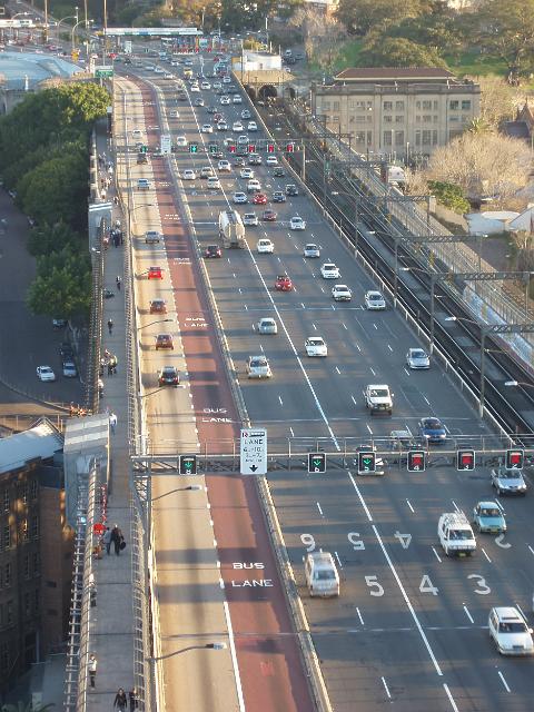 view from above: traffic flowing into and out of sydney CBD from the harbour bridge access ramp