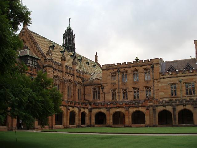 shady lawn and gothic revival cloisters of sydney university quadrangle