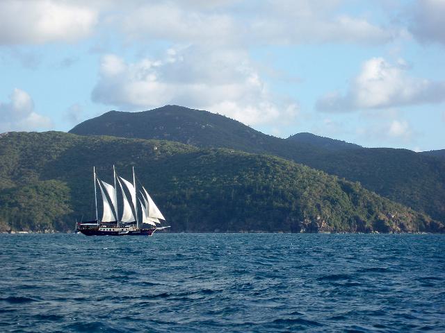 sailing boat whitsunday magic passing hook island, north queensland