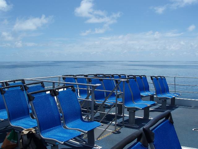 open air seats on the deck of a passenger boat