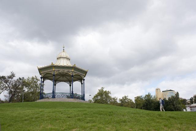 Bandstand on the skyline on a hilltop in a park in Adelaide, South Australia looking up the hill from below