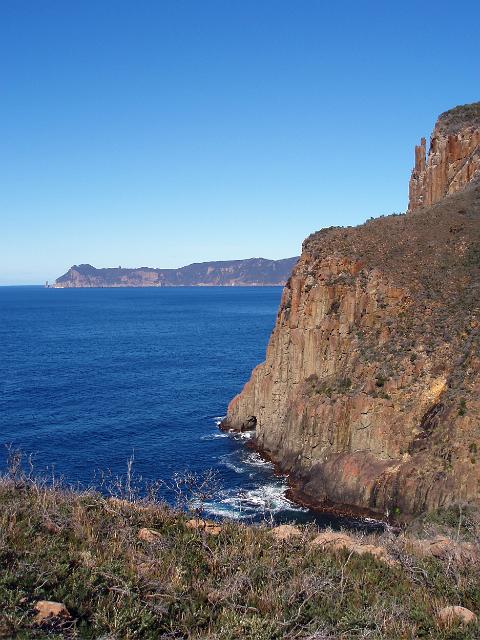 a view of Cape pillar across the water from Cape Hauy